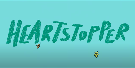 a banner for Heartstopper-- with the word written out in what appears to be marker on a teal backdrop