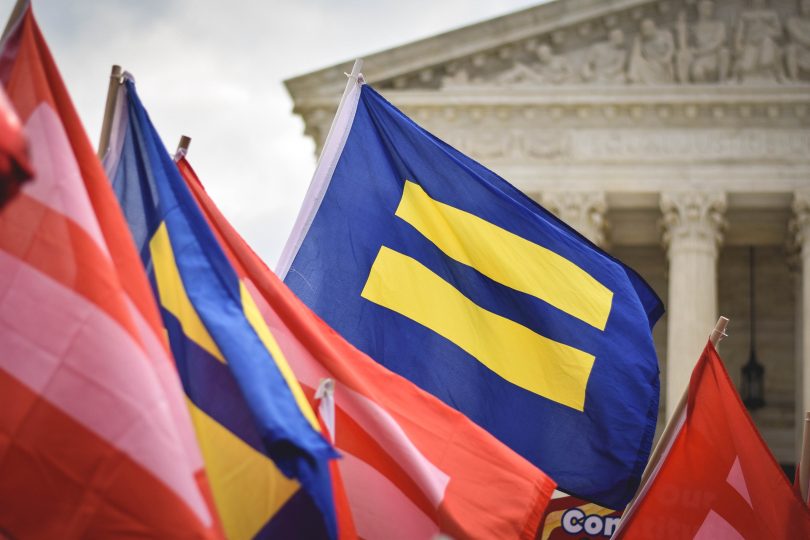 equality flags waving outside of the US Supreme Court