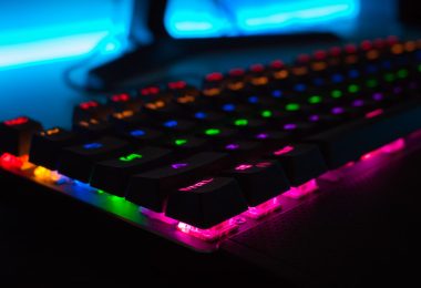 a close-up shot of a rainbow keyboard