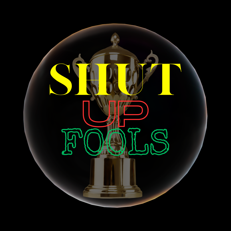 A Black square with Yellow red and green lettering spelling out Shut Up Fools in front of a gold trophy surrounded by a bubble.