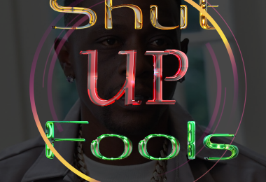 A blackened box with a photo of this week's shut up fool Lil Boosie. Shut Up Fool is in yellow, red, and green lettering surrounded by two duotone circles.